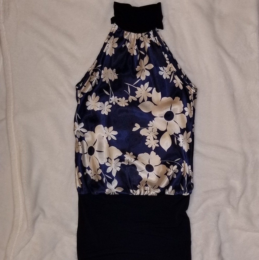 Navy blue blouse, sleeveless with flower print